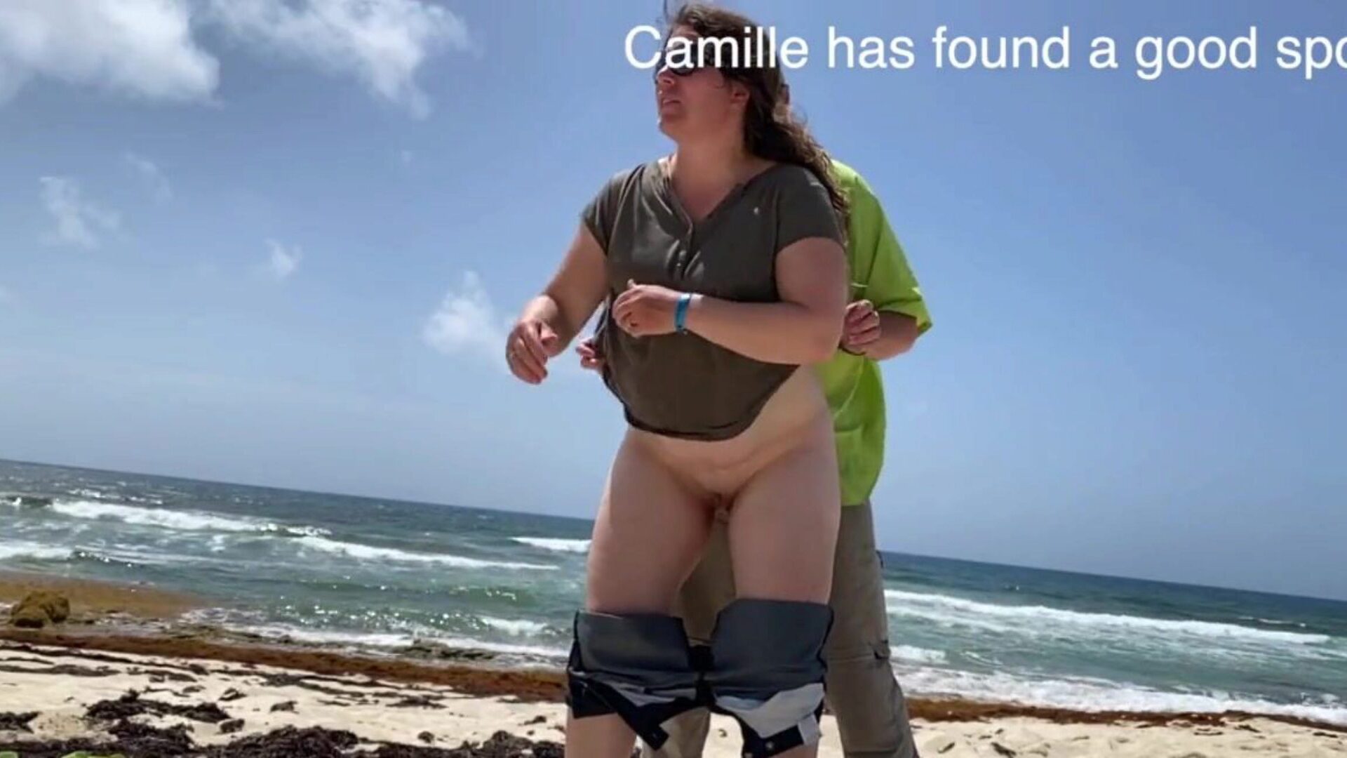 Camille watched having hump on the beach Camille found a precious spot with some people observing Be noisy so everyone will watch
