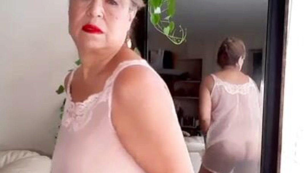 Mature bbw female with bushy pussy dressed in  sheer nightgown