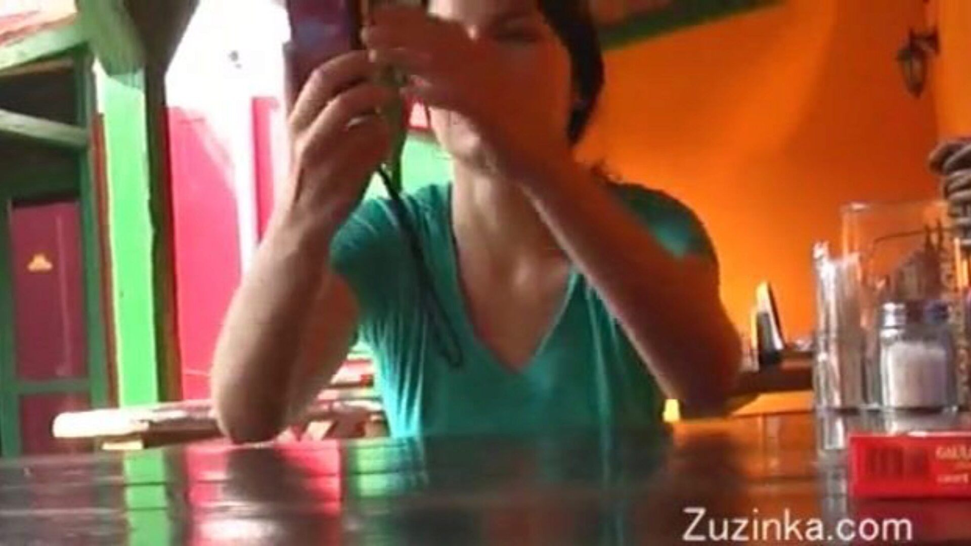 Czech cutie massages herself to large O in a crowded restaurant (real)
